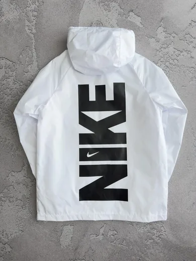 Вітрівка Nike біла принт — складова набору Набір Nike вітрівка біла кофта та штани з лампасами чорні