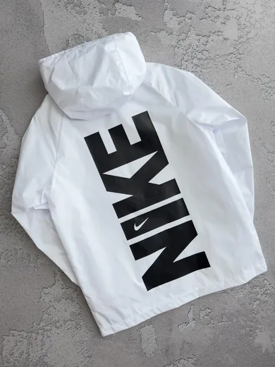 Вітрівка Nike біла принт — складова набору Набір Nike вітрівка біла кофта та штани з лампасами чорні
