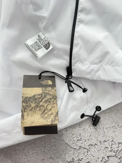 Вітрівка The North Face біла фото 10