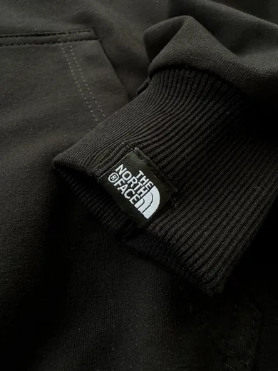 Зіп-худі The North Face чорне — складова набору Набір The North Face вітрівка зіп-худі та штани чорний